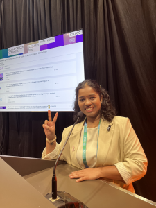Dr Shaminee presenting at WCC HK 2026