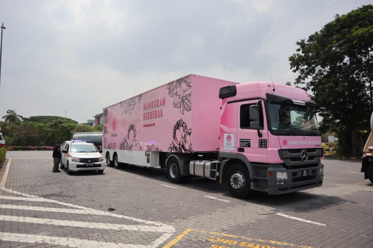 Image of MAKNA's pink mobile mammogram trailer